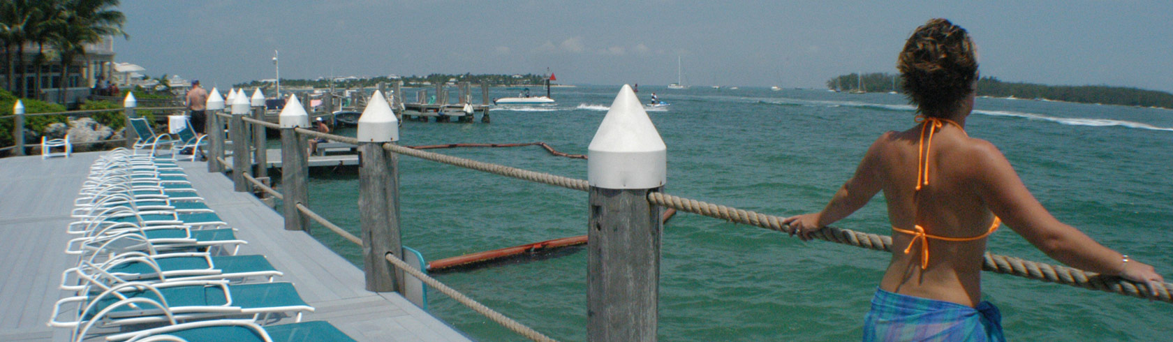 Galleon Marina a women looking out to the harbor